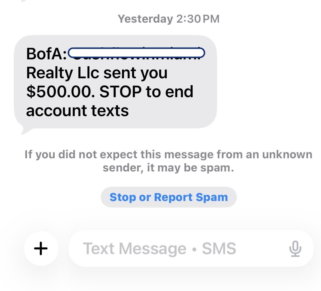 A phone notification showing a $500 payment received